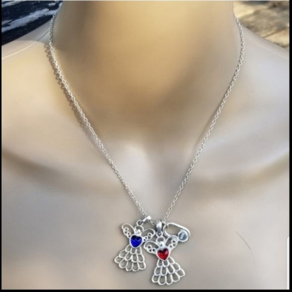 AVON VINTAGE SILVERTONED BIRTHSTONE ANGELS PENDANT NECKLACE - Picture 1 of 4